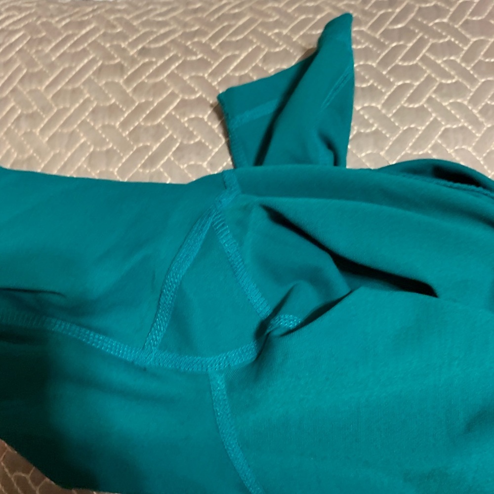 Green leggings.